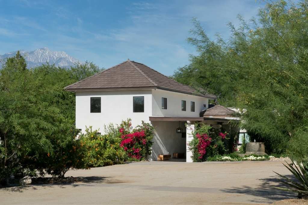Palm Springs wellness resort villa surrounded by desert garden and mountain views