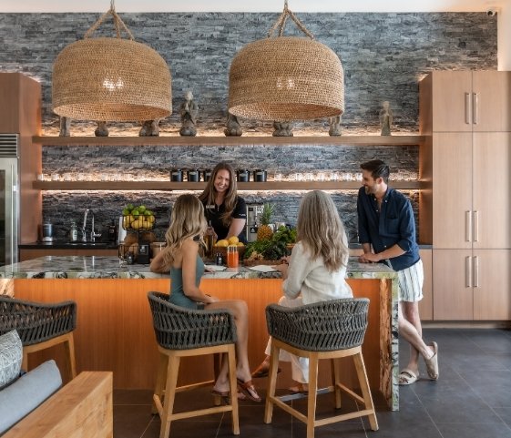 Guests enjoying a healthy juice session at a California luxury wellness retreat