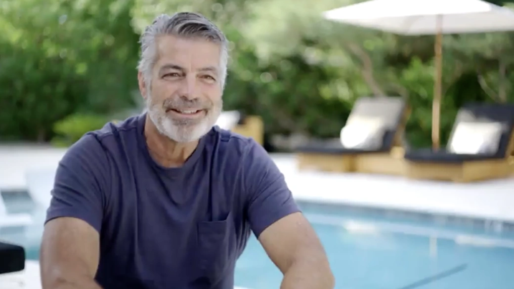 Dave Rossi shares his liquid detox experience beside the pool at We Care Spa