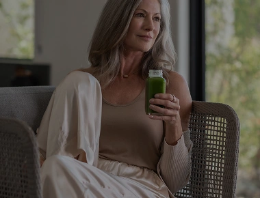 Guest enjoys a fresh green juice as part of the detox experience at We Care Spa