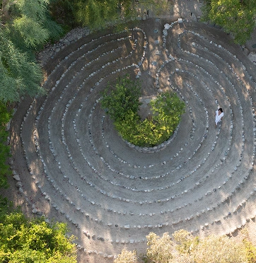Morning walking meditation through the labyrinth garden at We Care Spa.