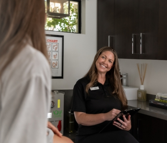 Guest consults with a wellness specialist at a holistic healing retreat in California.