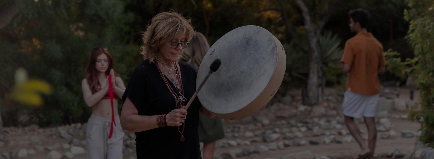 Guests participate in a guided sound healing session at a holistic healing retreat California