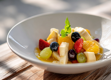 Fresh fruit bowl served during the healthy breakfast program at We Care Spa.