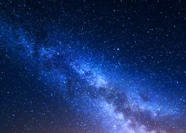 Star-filled night sky representing Cosmic Astrology in We Care Spa holistic wellness classes.